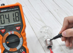 Using a multimeter to check a light source